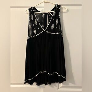 Free people sleeveless blouse. Size M